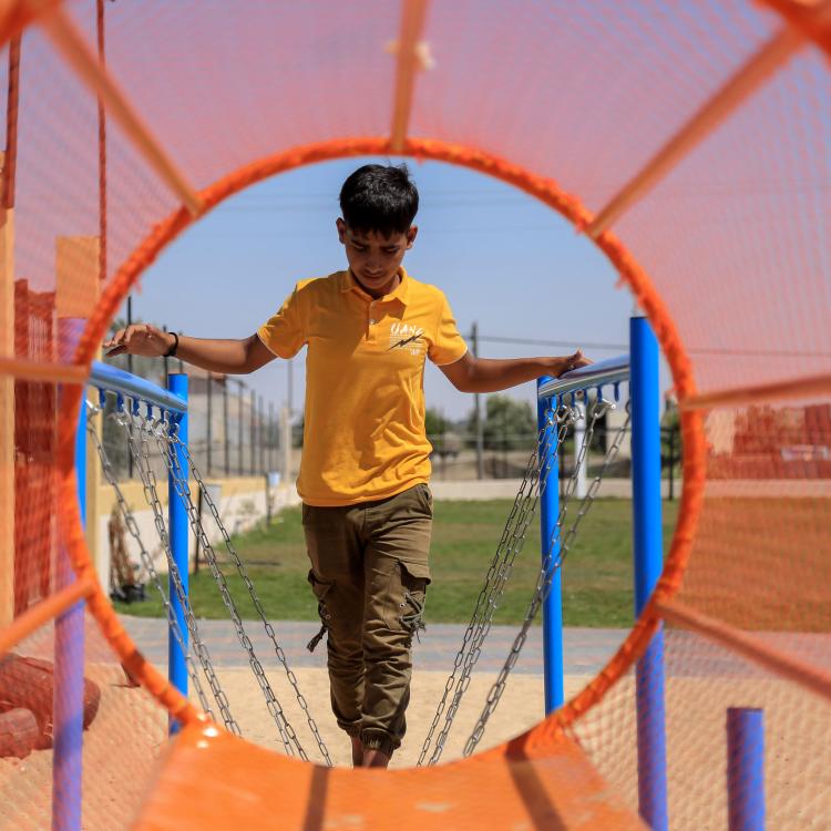 young boy at a playground